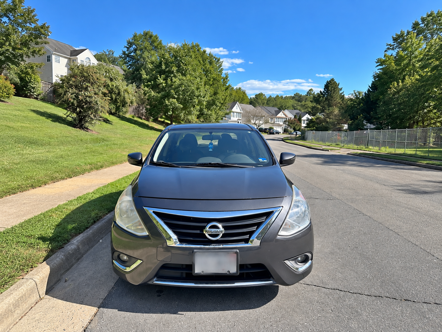 Gray Nissan Versa from Mo Car Rentals